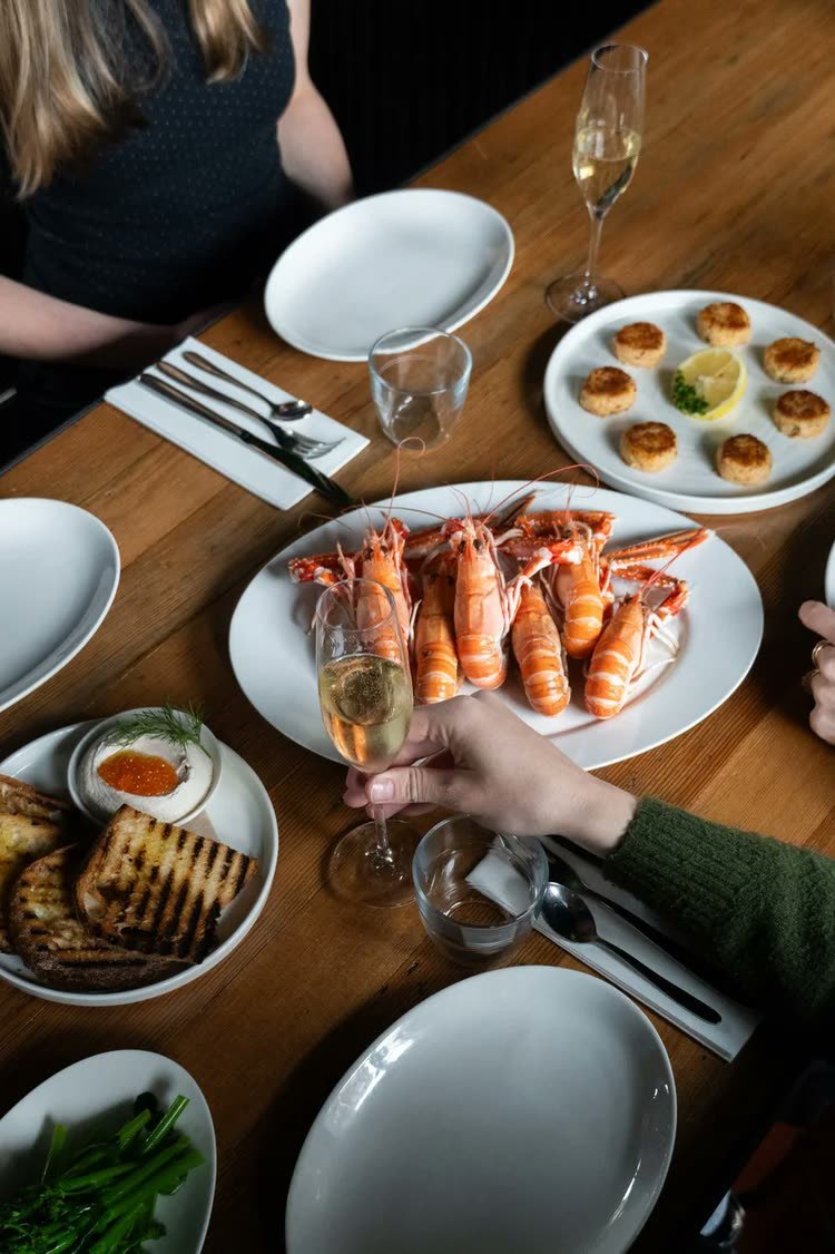 Crabshakk — langoustines and champagne across the table