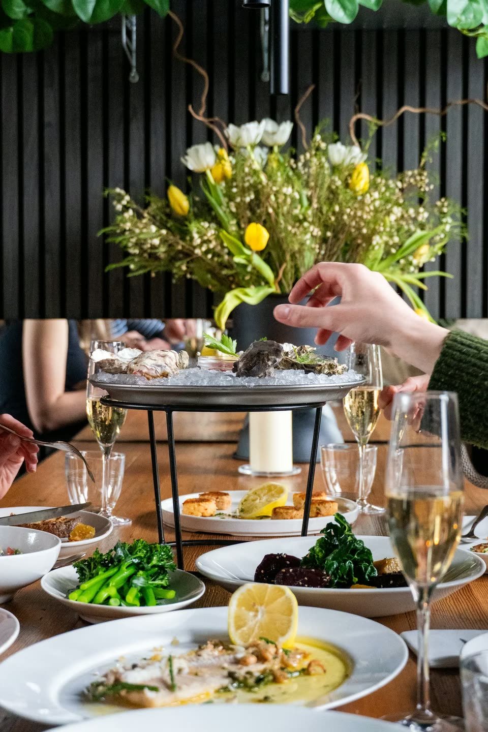 Crabshakk — seafood tower and flowers on the table