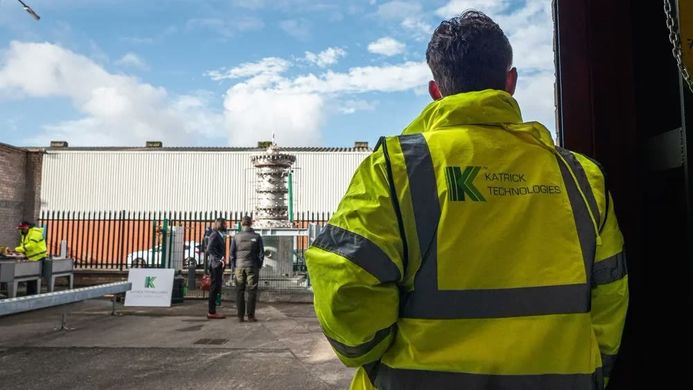 Katrick Technologies — the team on site beside the array