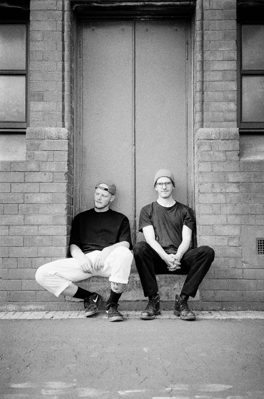 Palace Flophaus — the duo in a doorway, 35mm