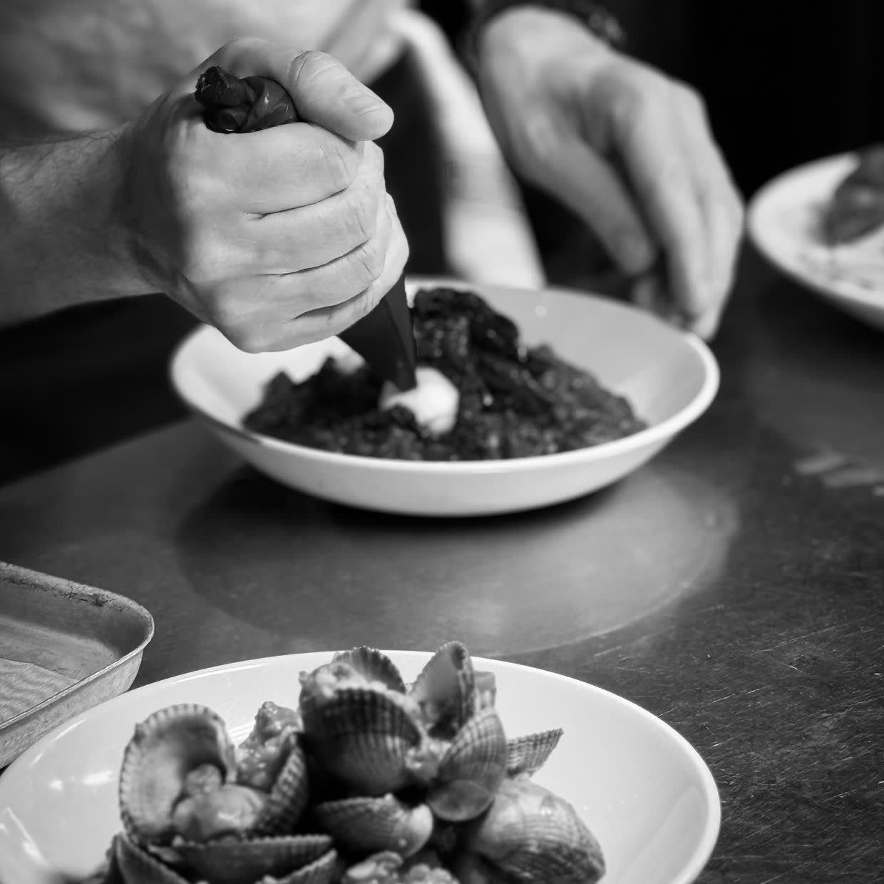 Crabshakk — seafood plating, black and white